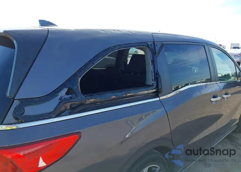 2022 Honda Odyssey Touring z USA, uszkodzony, nr VIN 5FNRL6H85NB018305